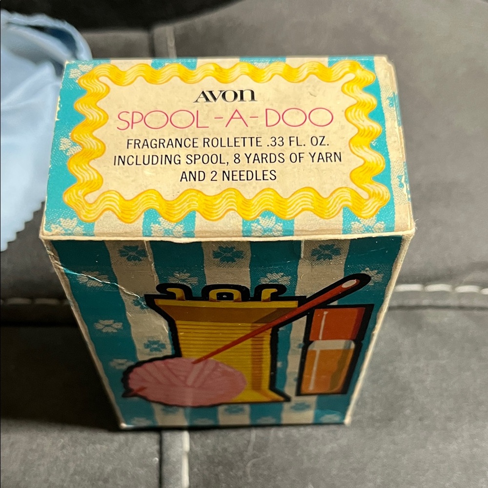 Avon Spool-A-Doo Fragrance Rollette with Yarn
